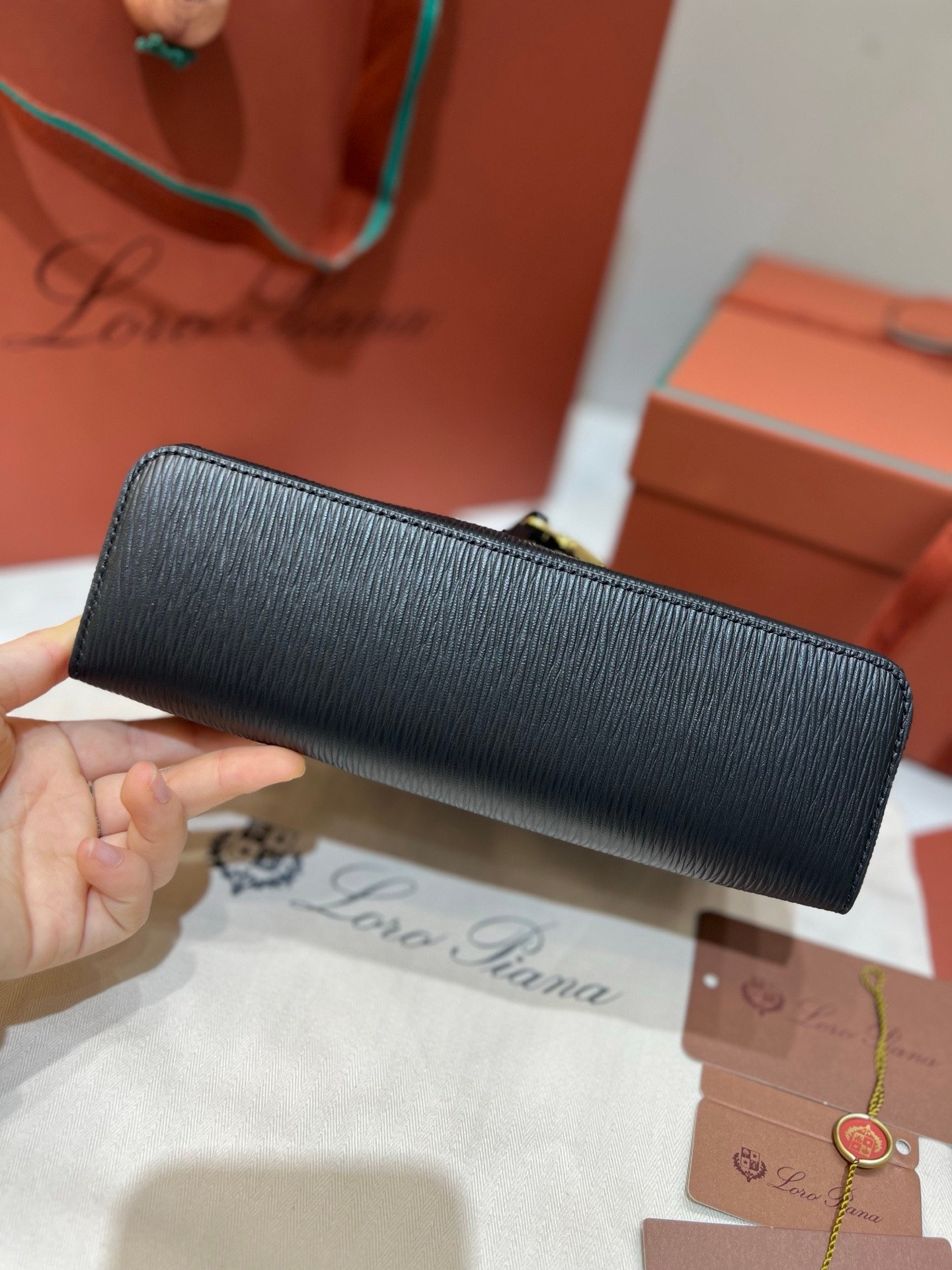 Loro Piana L23 Extra Handbag 23cm Black Textured Leather Minimalist Shoulder Bag with Gold Hardware and Gift Box Loro Piana L23 Extra Handbag 23cm Black Textured Leather Minimalist Shoulder Bag with Gold Hardware and Gift Box