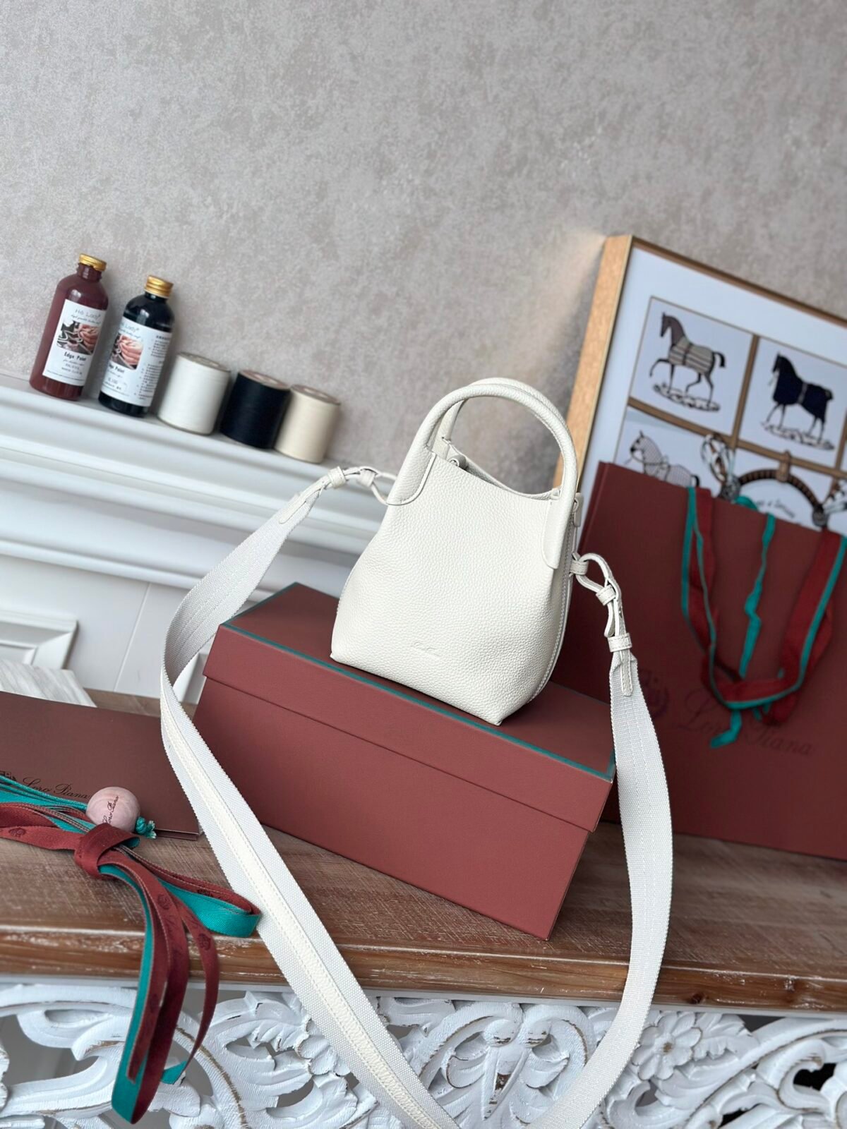 Loro Piana Mini Bale Bag 13x16x13cm Grained Calfskin Luxury Designer Mini Bucket Bag with Adjustable Crossbody Strap Loro Piana Mini Bale Bag 13x16x13cm Grained Calfskin Luxury Designer Mini Bucket Bag with Adjustable Crossbody Strap