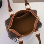 Celine Triomphe Canvas Small Boston Bag 19.5cm Vintage-Inspired Luxury Pillow Bag with Italian Leather Trim 9