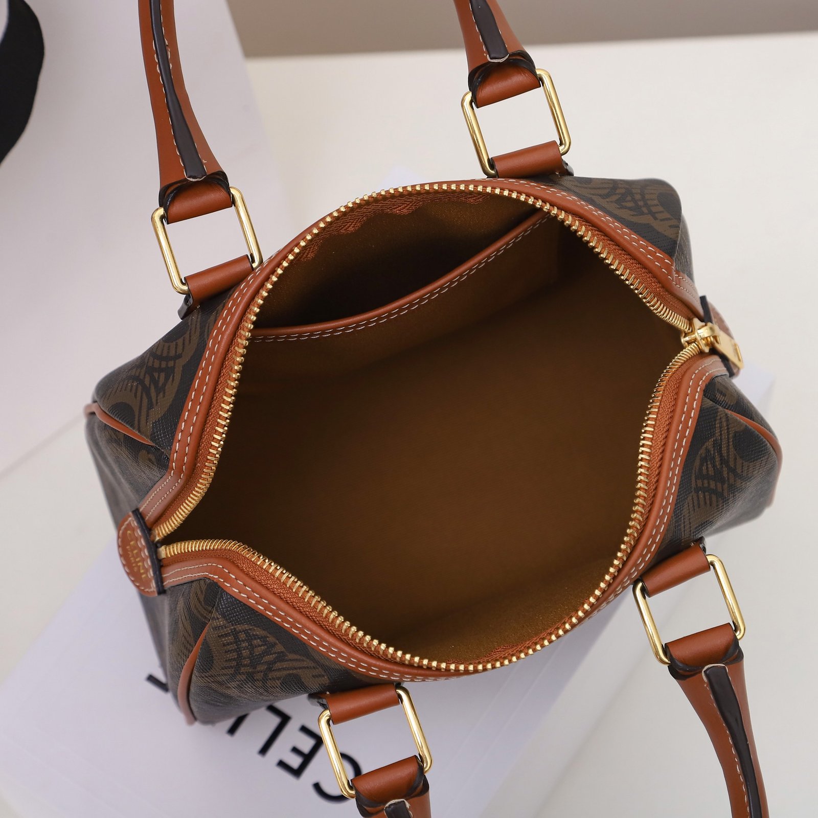 Celine Triomphe Canvas Small Boston Bag 19.5cm Vintage-Inspired Luxury Pillow Bag with Italian Leather Trim 9