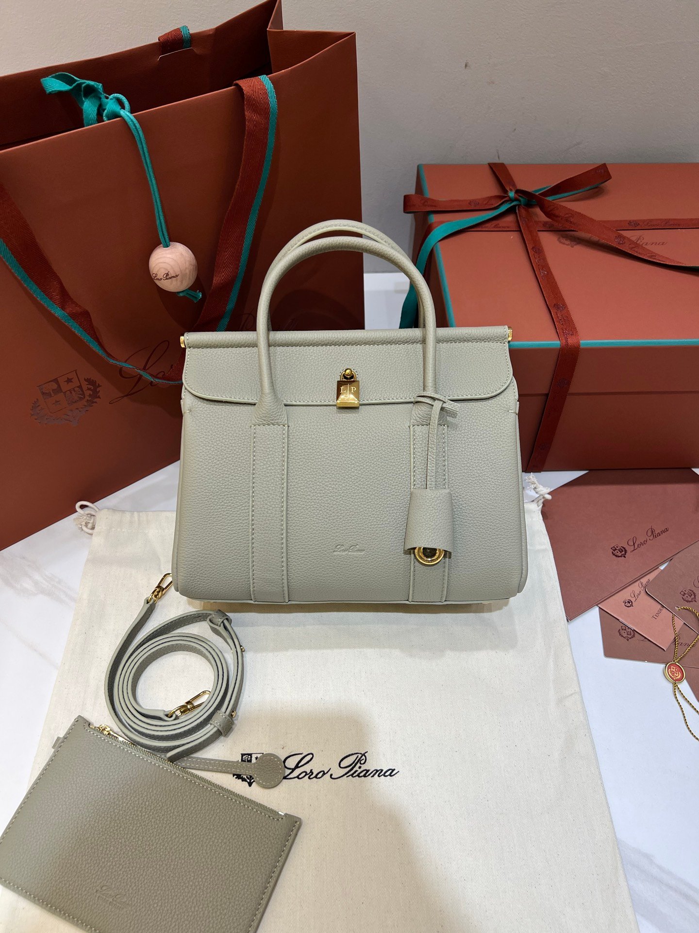 Loro Piana Loom L25 Handbag 25cm Tender Calfskin Leather Top-Handle Bag with Crossbody Strap and Iconic Padlock
