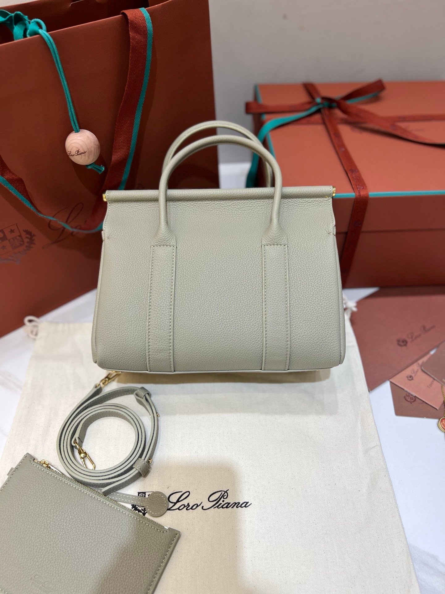 Loro Piana Loom L25 Handbag 25cm Tender Calfskin Leather Top-Handle Bag with Crossbody Strap and Iconic Padlock