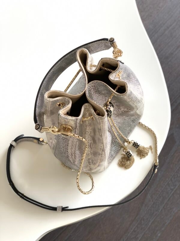 25 BVLGARI Serpenti Forever Metallic Karung Leather Bucket Bag 16cm Exotic Drawstring Crossbody and Top Handle Handbag with Signature Snakehead Closure