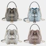 BVLGARI Serpenti Forever Metallic Karung Leather Bucket Bag 16cm Exotic Drawstring Crossbody and Top Handle Handbag with Signature Snakehead Closure BVLGARI Serpenti Forever Metallic Karung Leather Bucket Bag 16cm Exotic Drawstring Crossbody and Top Handle Handbag with Signature Snakehead Closure