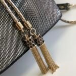 BVLGARI Serpenti Forever Metallic Karung Leather Bucket Bag 16cm Exotic Drawstring Crossbody and Top Handle Handbag with Signature Snakehead Closure BVLGARI Serpenti Forever Metallic Karung Leather Bucket Bag 16cm Exotic Drawstring Crossbody and Top Handle Handbag with Signature Snakehead Closure