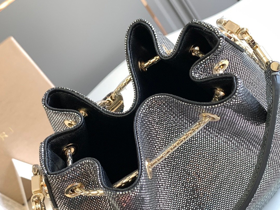 BVLGARI Serpenti Forever Metallic Karung Leather Bucket Bag 16cm Exotic Drawstring Crossbody and Top Handle Handbag with Signature Snakehead Closure BVLGARI Serpenti Forever Metallic Karung Leather Bucket Bag 16cm Exotic Drawstring Crossbody and Top Handle Handbag with Signature Snakehead Closure